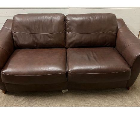 A brown leather lounge suite, comprising of a reclining chair, two seater sofa and three seater sofa 