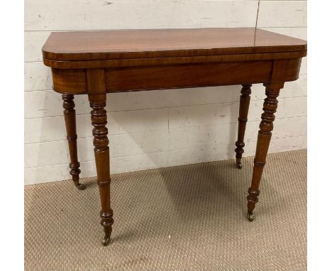 A mahogany card table on turned legs AF (H74cm D46cm W921cm)