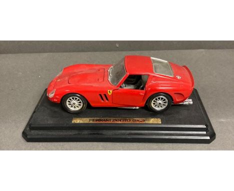 A boxed wine companion and two model cars, a Ferrari 250 GTO on plinth and a Corgi Mercedes 300SL 