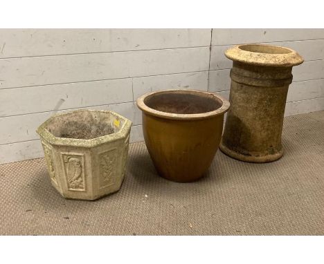 A selection of two garden pots and a chimney pot planter 