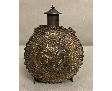 An antique brass German gunpowder flask, brass with George and the Dragon detail 