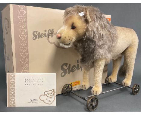 Steiff (Germany) EAN 400445, Lion On Wheels 1909, replica, dark blond mohair, trademark 'Steiff' button to ear with black and