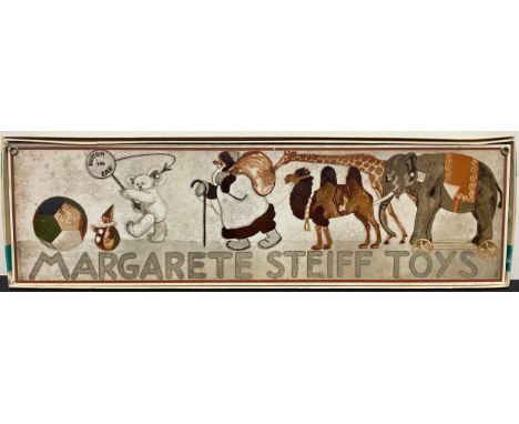 A reproduction "Margarete Steiff Toys" enamel shop sign, 14cm x 48cm, boxed