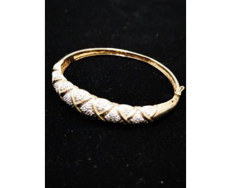 9CT GOLD ORNATE DIAMOND BANGLE 13.8G