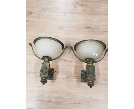 A PAIR OF LATE VICTORIAN LIGHT FITTINGS WITH LION HEAD HANDLES