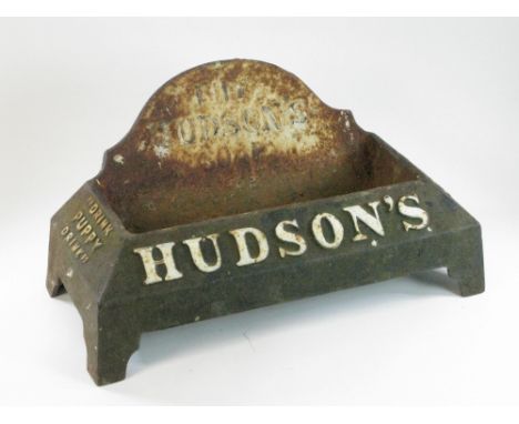 A Cast Iron Dog Drinking Trough embossed with 'Buy Hudson's Soap' and 'Drink Puppy Drink' 15-inches wide, 7-inches deep