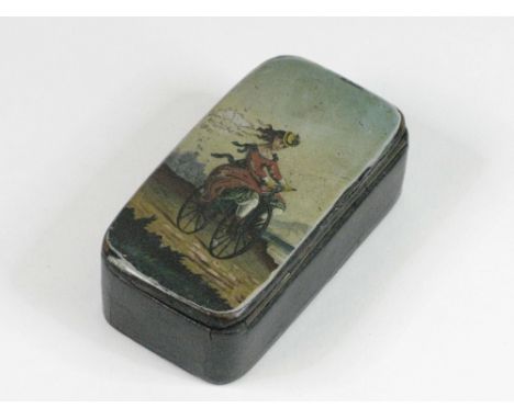 A Papier Mache Patch Box  with a colour depiction of a lady Velocipède rider in a countryside setting, on the hinging lid.
