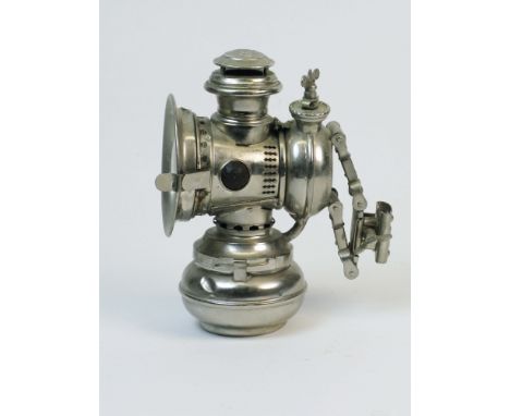 A c1900 Max Pressler Acetylene Gas Lamp Nickel-plated on brass, having a bayonet-fitting carbide of calcium bowl, saddle-moun