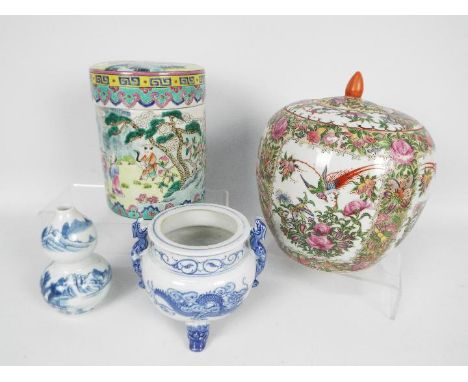 Chinese ceramic group to include a blue and white censer with twin chilong handles and tripod mask supports, a blue and white