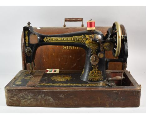 A Vintage Cased Singer Sewing Machine 
