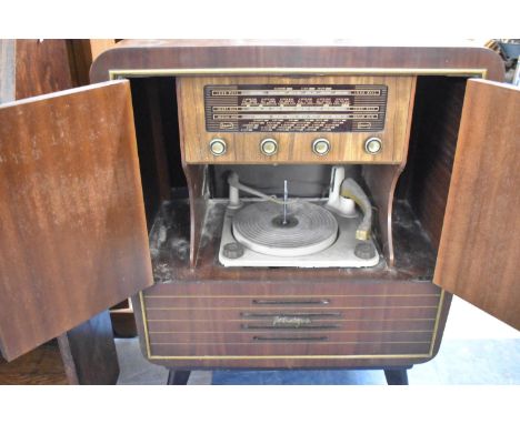 A Vintage Portadyne Walnut Radiogram, 65cm wide 