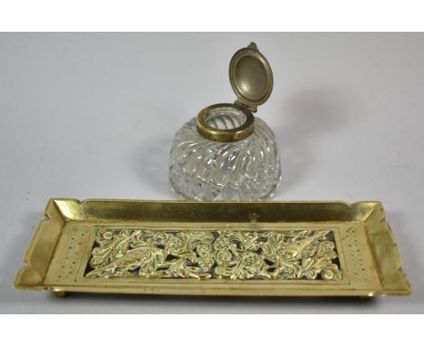 A Late 19th Century Pierced Brass Desktop Pen Rest, 20cm wide Together with a Silver Plate and Glass Circular Inkwell with Ri