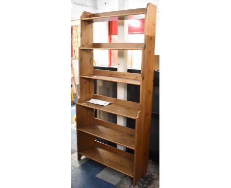 An Ikea Pine Six Shelf Galleried Waterfall Book Case, Leksvik, 92.5cm wide 