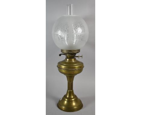 A Vintage Brass Oil Lamp with Etched Globe 