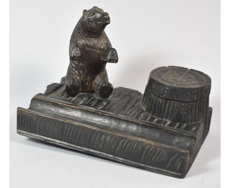 A Carved Black Forest Novelty Inkstand in the Form of Seated Bear Beside Tree Stump, with Original Glass Inkwell, 13cm wide 