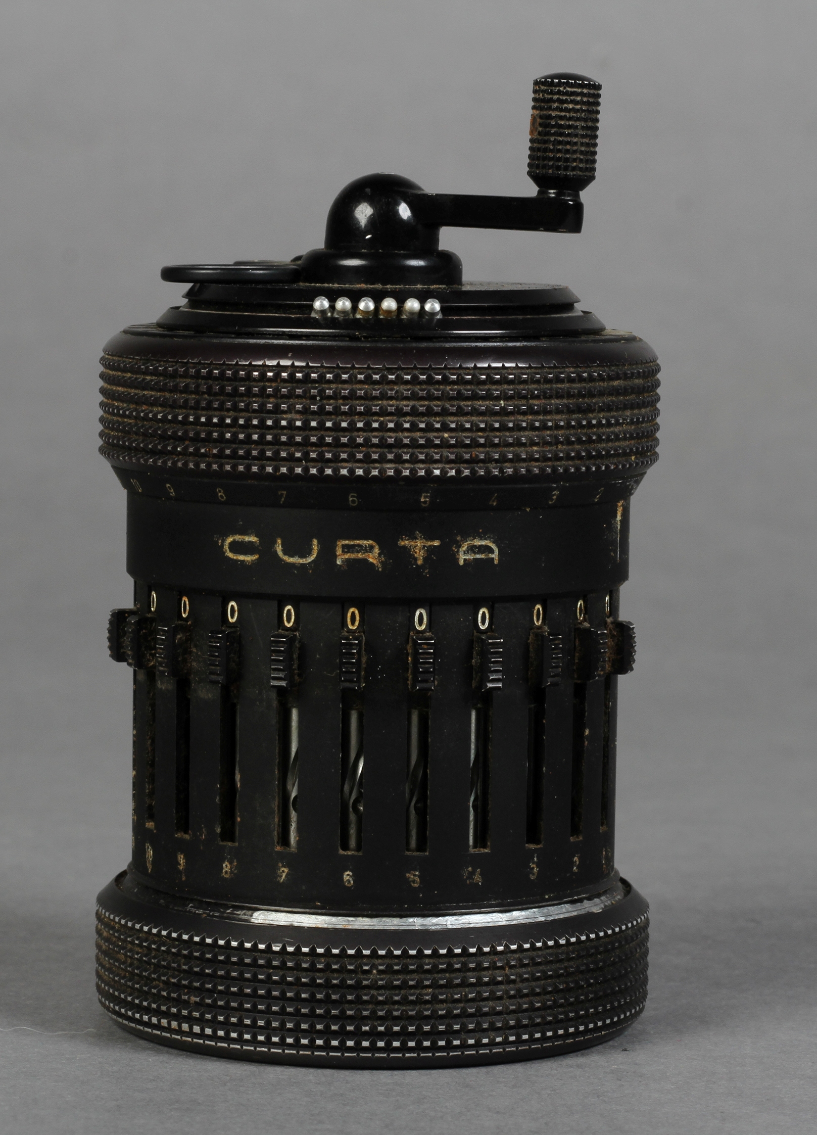 A CURTA CALCULATOR TYPE II, serial no. 506818, having a black body, 6