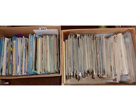 Two boxes of unsorted vintage and older postcards