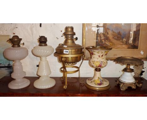 Victorian oil brass lamp with brass reservoir and brass stand, and two stands, and two Victorian milk glass oil lamp bases