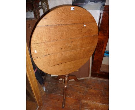 Victorian light oak circular tilt top table