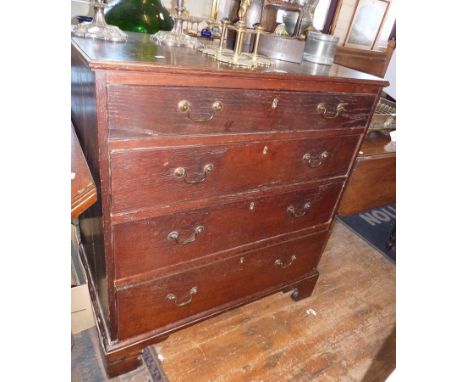 Georgian oak chest of four graduated drawers on bracket feet
