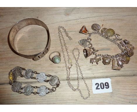 Assorted vintage silver jewellery inc. a charm bracelet with some hinged charms, a silver 3d coin bracelet, Wedgwood ring, ch