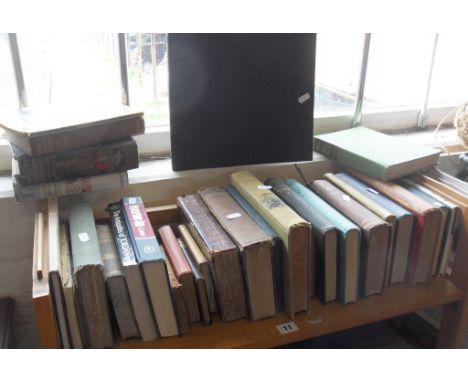 Shelf of assorted books including "The Beatles-an illustrated record" by Carr & Tyler