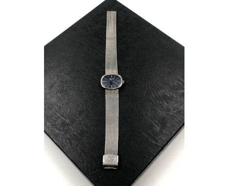 A FAVRE-LEUBA MANUAL WOUND SWISS LADIES WRIST WATCH ON A STAINLESS STEEL MAILANESE BRACELET, AND A BLUE DIAL. WATCH FULLY WIN