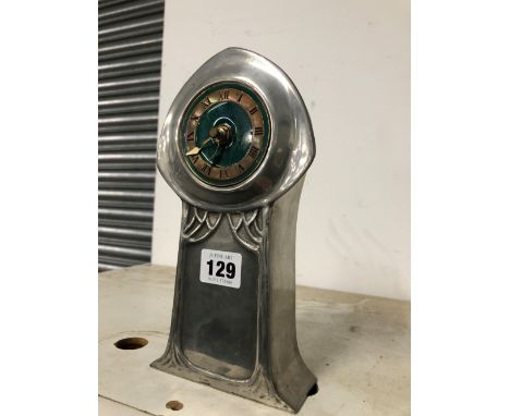 A LIBERTY HERITAGE PEWTER CASED BATTERY OPERATED CLOCK WITH A GREEN ENAMEL DIAL