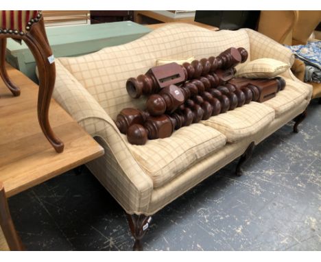 A LARGE GEORGIAN STYLE CAMEL BACK SOFA 