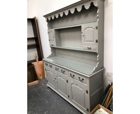 A GOOD QUALITY PAINTED PANEL DOOR DRESSER AND PLATE RACK