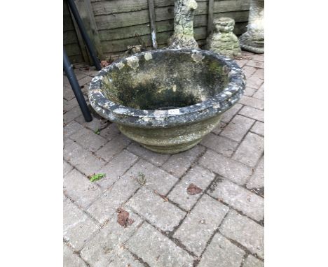 A LARGE COMPOSITE TERRACE PLANTER.
