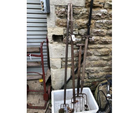 FOUR VINTAGE GARDEN TOOLS