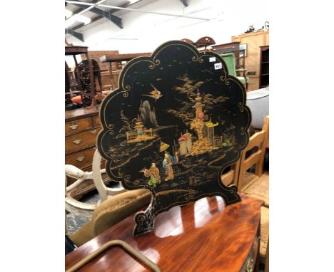 A LACQUER FIRE SCREEN 