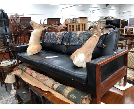 A MID-2Oth CENTURY TEAK AND BLACK VINYL THREE SEATER SOFA. H 77 W 206 D 85cms