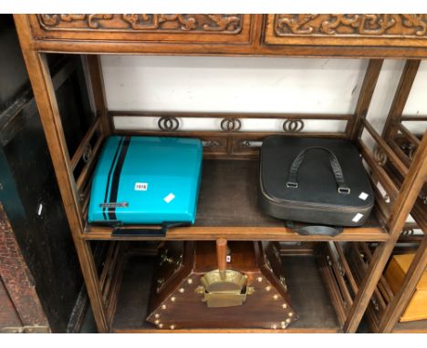 A SMITH CORONA TYPEWRITER TOGETHER WITH AN EMPIRE CORONA TYPEWRITER IN ZIP UP CASE