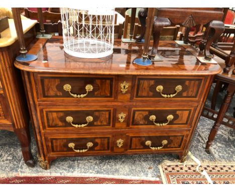 AN ANTIQUE FRENCH INLAID LABURNAM AND EXOTIC WOOD PARQUETRIED THREE DRAWER COMMODE ON ROUNDED ORMOLU MOUNTED FEET. W 117 x D 