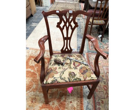A SET OF SIX MODERN MAHOGANY CHIPPENDALE TASTE DINING CHAIRS TO INCLUDE TWO WITH ARMS, THE DROP IN SEATS ABOVE CHANNELLED SQU