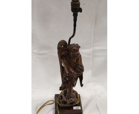 A VINTAGE CHINESE HARDWOOD CARVED ORIENTAL FIGURE ON LAMP BASE