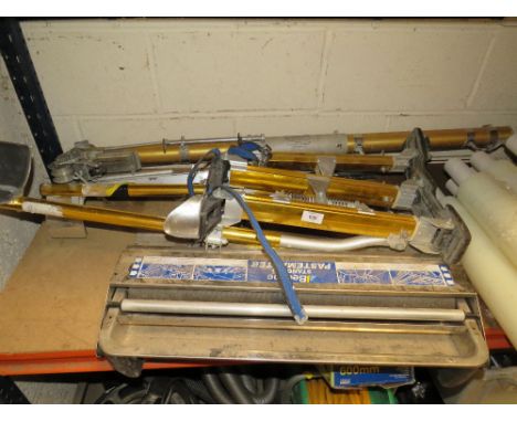 A PAIR OF DECORATORS PAINTING STILTS, BEELINE PASTEMASTER ETC (ALL ON SHELF)