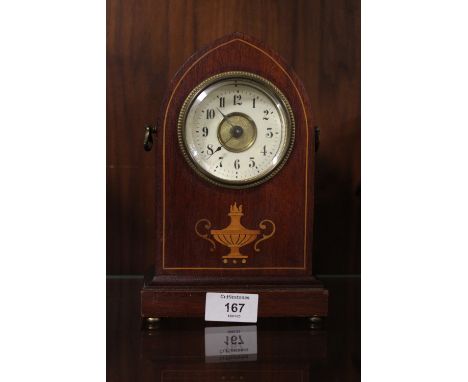 AN INLAID DOME SHAPED MAHOGANY MANTLE CLOCK