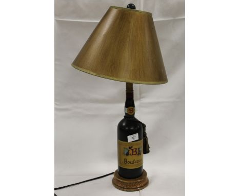 A NOVELTY LAMP IN THE FORM OF A BOTTLE OF BORDEAUX