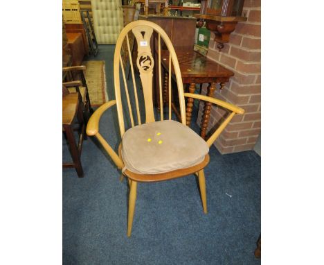 AN ERCOL 'SWAN' BACK BEECH CHAIR