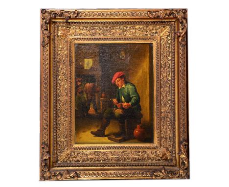 FOLLOWER OF DAVID TENIERS Seated figure with bowl and pipe in a tavern interior, oil on canvas, 36 x 28cm
