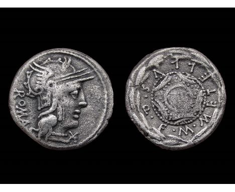 M. Caecilius Q.f. Metellus Denarius. Circa, 127 B.C. Silver, 3.86g. 18.13 mm. Helmeted head of Roma right, monogram below chi