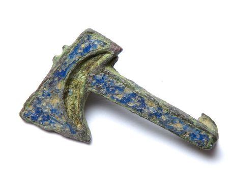 Roman axe plate brooch. A skeuomorphic plate brooch in the form of an axe with light blue champleve enamel decoration on the 