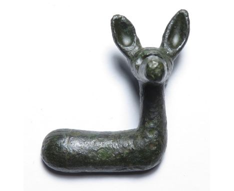 Iron Age deer mount. A late Iron Age zoomorphic bronze mount in the form of a deer right with its head turned to face the vie