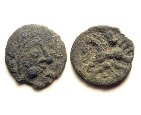 Dobunni Cotswold Cock Silver Unit. Size: 13mm, 0.74g. Obverse: Moon head right, pellet crescents as hair. Reverse: Triple-tai