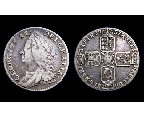 George II Sixpence. Silver, 3.06g. 21.16 mm. Old laureate and draped bust left. R. Crowned cruciform shields, 1757. Ref: Spin