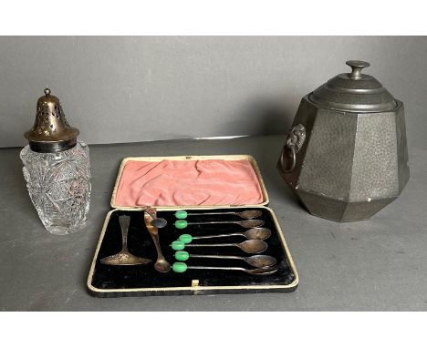 A small selection of silver plated items to include a sugar sifter, six coffee bean spoons, sugar nips and a hexagonal pewter