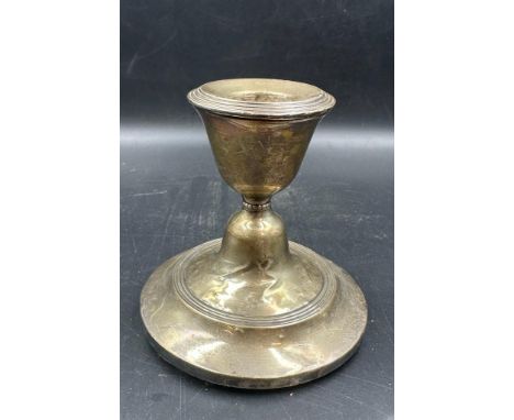 A silver candle stick hallmarked for Birmingham AF